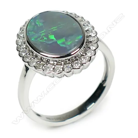 A 14ct white gold Lightening Ridge opal and diamond halo ring,