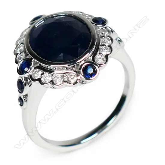 A 14ct white gold sapphire and diamond vintage style ring,