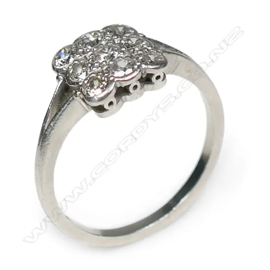 An estate platinum and diamond ring,