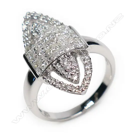 An 18ct white gold and diamond cluster ring of marquise form,