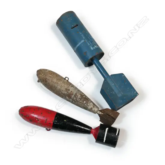 Three various practice projectile rockets,