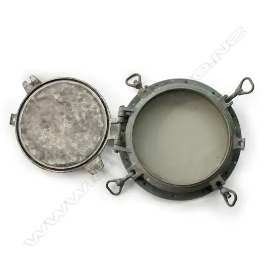 An old ship's bronze porthole,