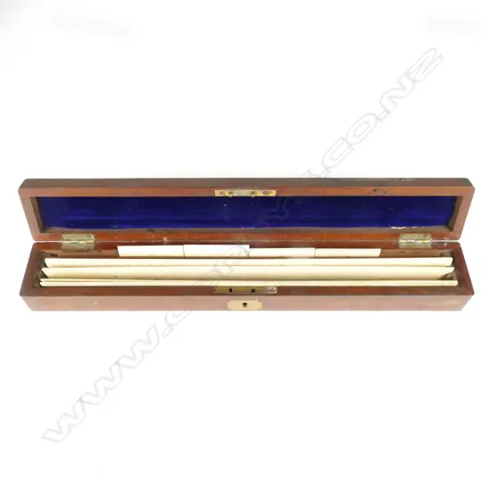A Victorian mahogany cased set of four ivory rulers