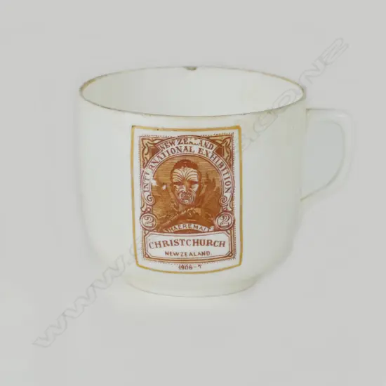 A lustre coffee cup commemorating the N.Z. International Exhibition