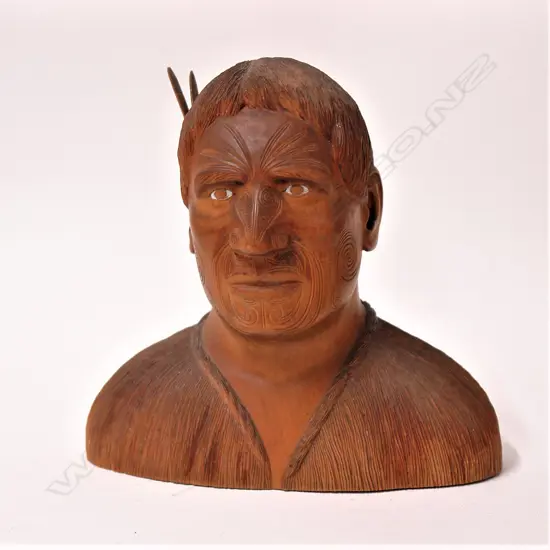 A finely carved hardwood bust of a Maori chief