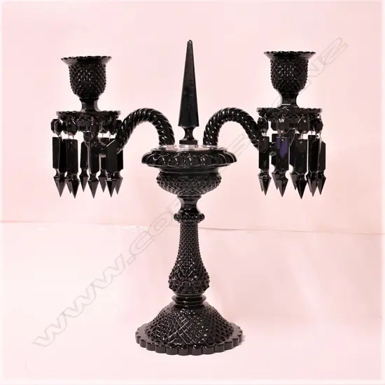 A modern Baccarat black lead crystal table candelabra