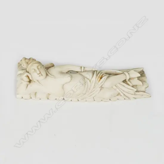 An old ivory Chinese doctor's model of a reclining woman