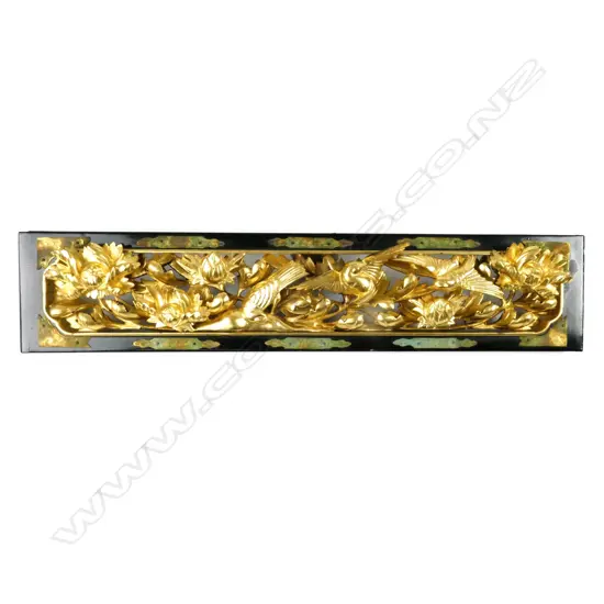 A carved and pierced gilded carving