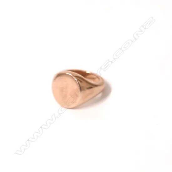 A 9ct. rose gold plain signet ring