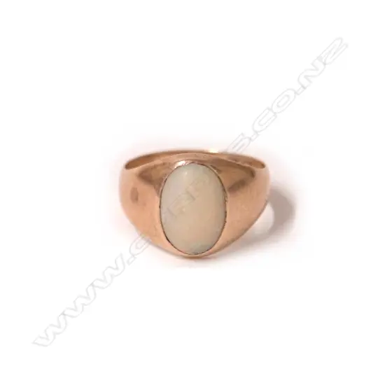 An estate 9ct. yellow gold and opal ring