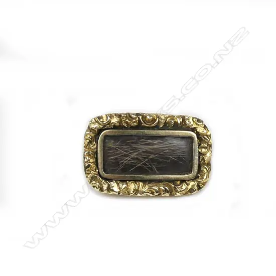 A small Victorian 15ct gold mourning brooch