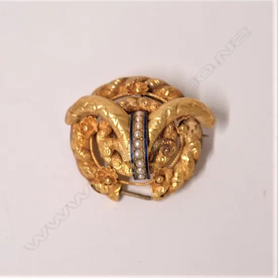 A fancy 19thC gilded 18ct. yellow gold seed pearl and enamel brooch