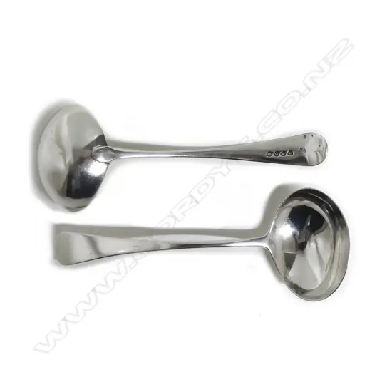 A pair of George III silver ladles