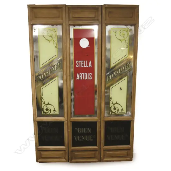 A set of three old door panels from a Ponsonby hotel