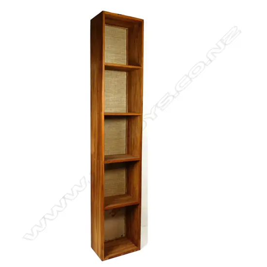 A tall mid/late 20thc rimu open compartment shelf