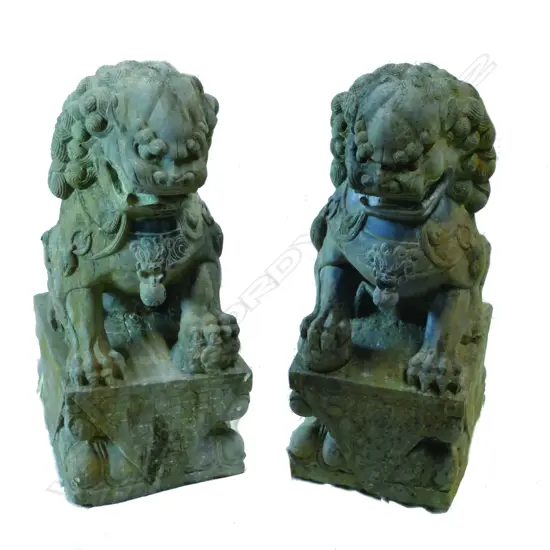 A pair of old Chinese carved stone temple lion dogs