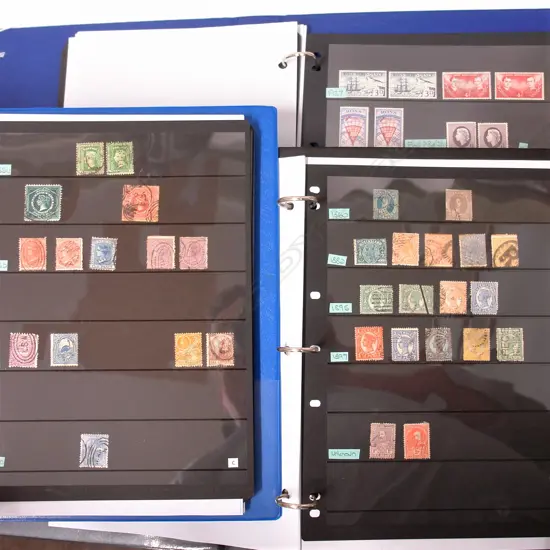 Three albums of world stamps