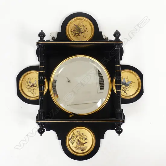 An Aesthetic ebonized and gilded wall shelf