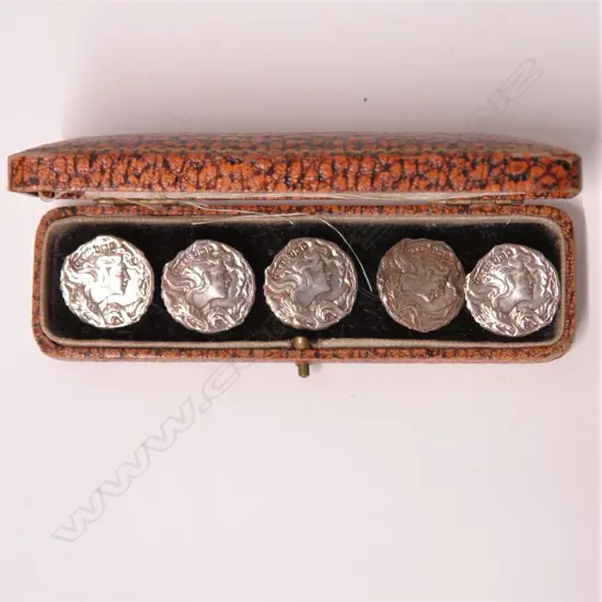 A set of five Art Nouveau silver buttons