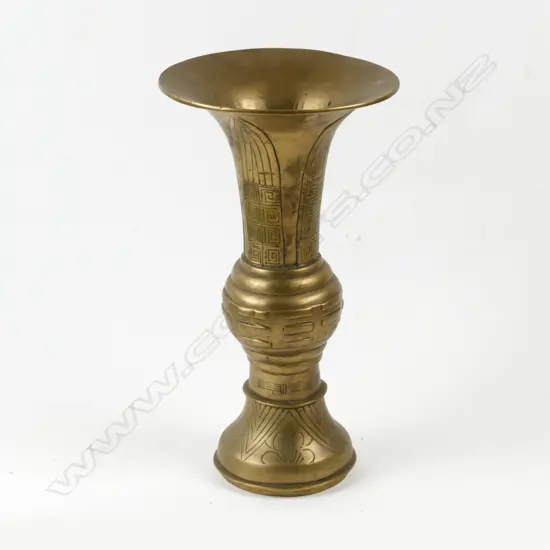 A Chinese brass gu form vase