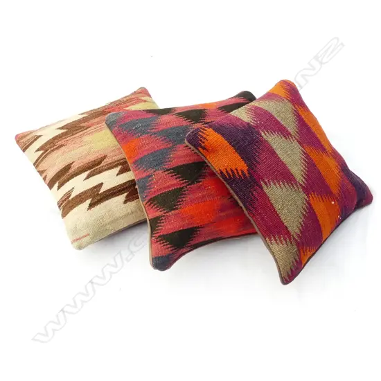 Three kilim cushions