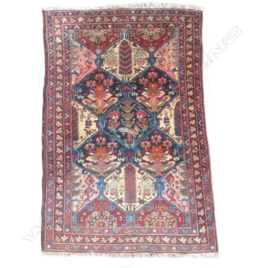 A hand knotted Persian rug