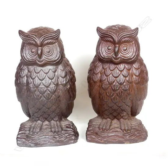 A pair of high fired stoneware garden owl statues