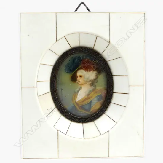 A hand painted portrait miniature on ivory