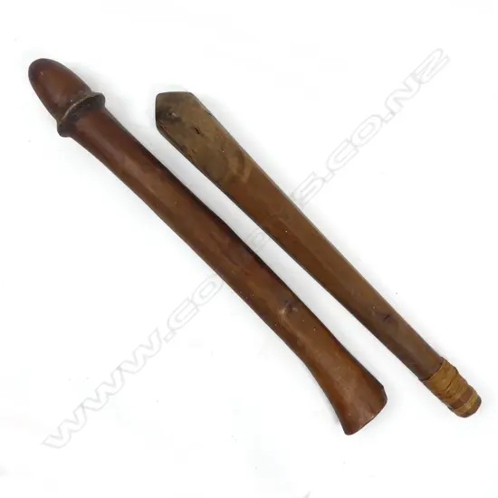 A Vanuatuan penis shaped club and a Tongan seven-sided club