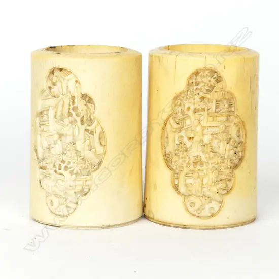 A pair of Chinese ivory carved small cylinder vases