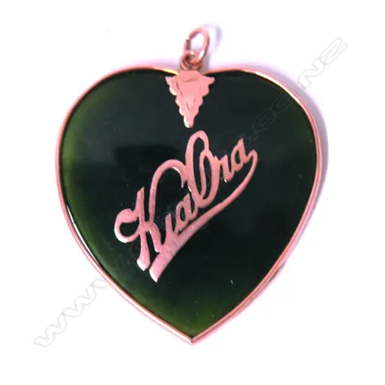 An early 20thC N.Z. Stewart Dawson & Co. nephrite and rose gold 'Kia Ora' heart pendant