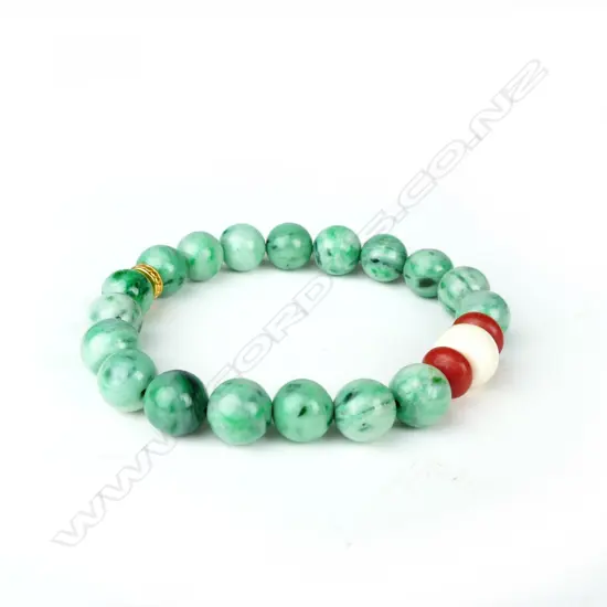 A jadeite and precious bead bracelet