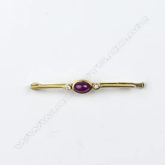 A vintage 18ct. yellow gold ruby and diamond bar brooch