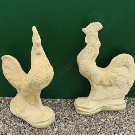 A pair of English Church stone cockerel sculptures