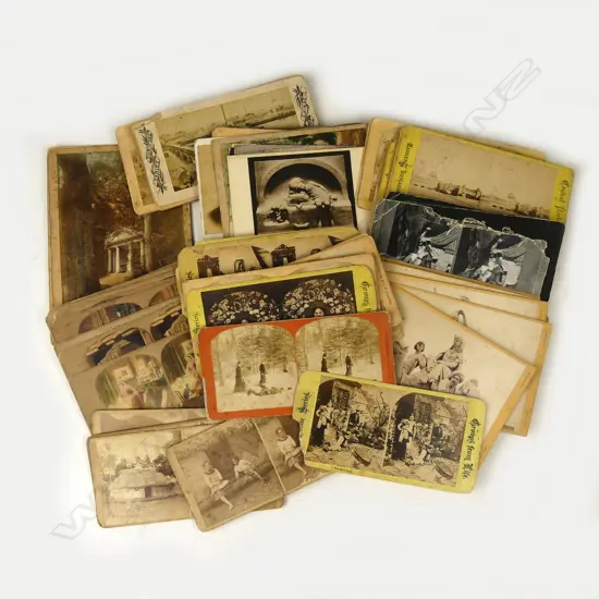 A collection of approximately 80 vintage stereoscopic cards