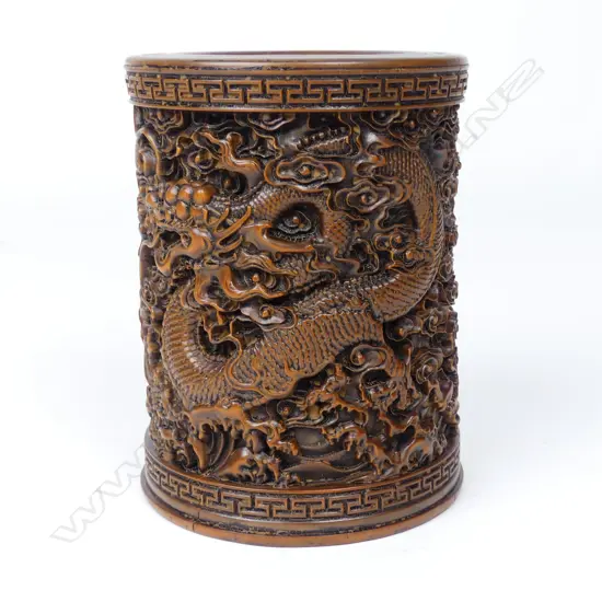 A Chinese finely carved wood brush pot