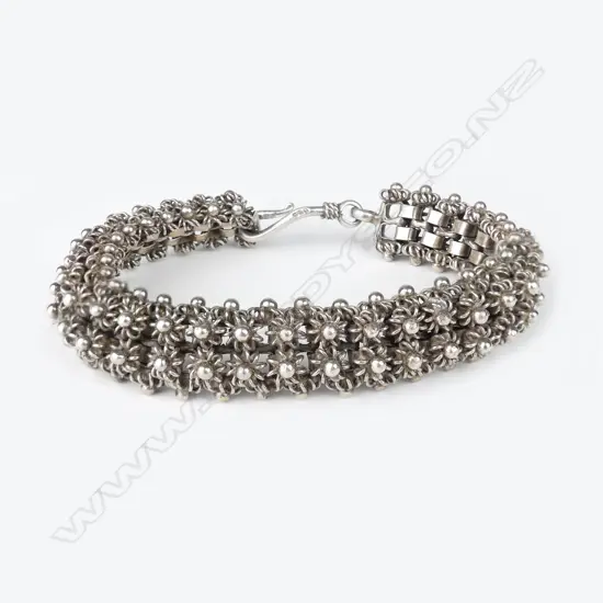 An ornate silver bracelet