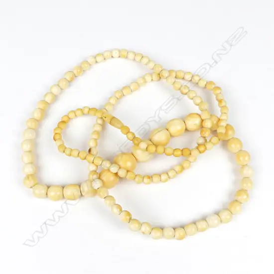 An antique ivory bead necklace