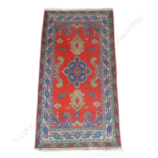 A vintage Persian Caucasian rug