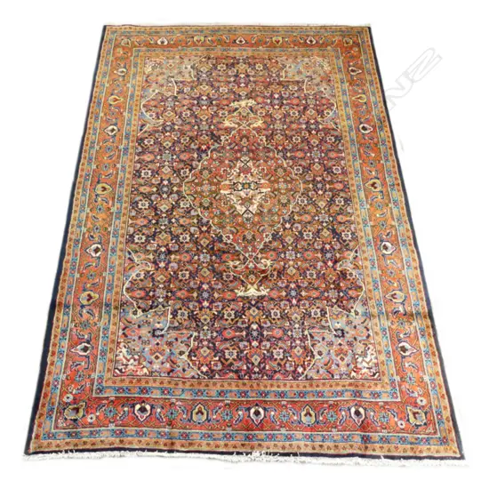 An Iranian Saruk hand knotted carpet