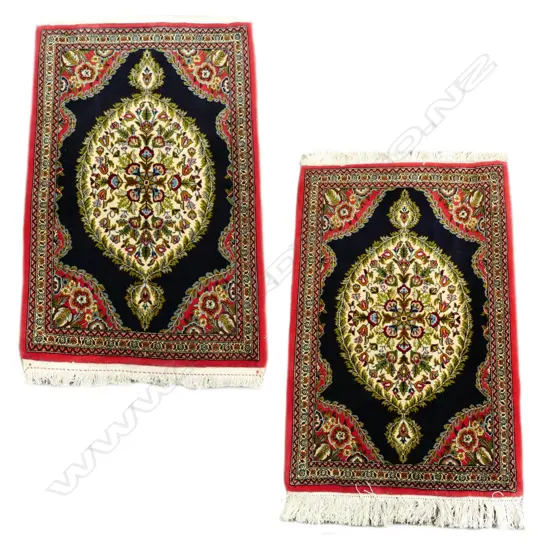 Two Iranian Qum rugs