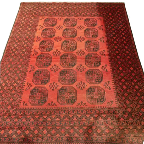 A large hand knotted Turkoman Ersari carpet