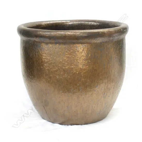 A large lustrous gold glazed garden pot