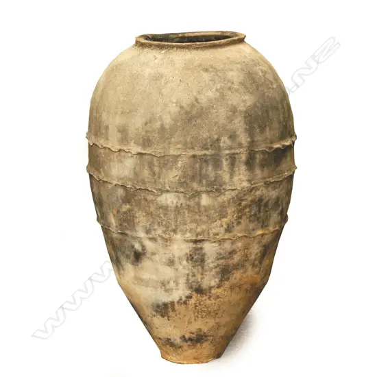 An old Turkish terracotta tall storage jar