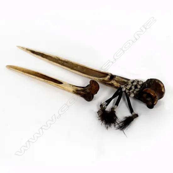 Two old Cassowary bone daggers