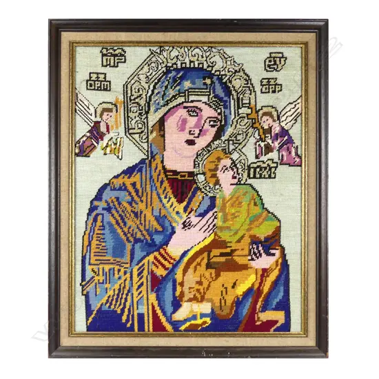 A vintage hand embroidered copy of a Russian icon