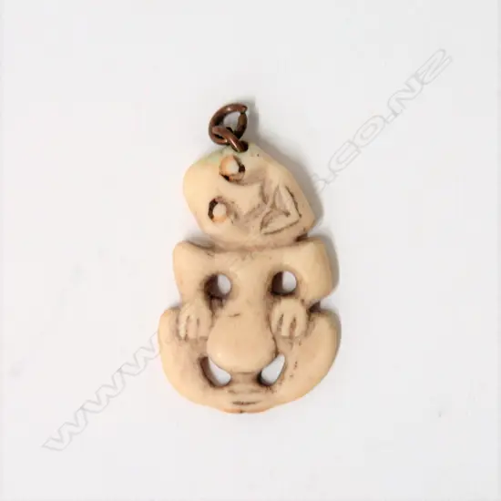 A small old marine ivory Maori hei tiki