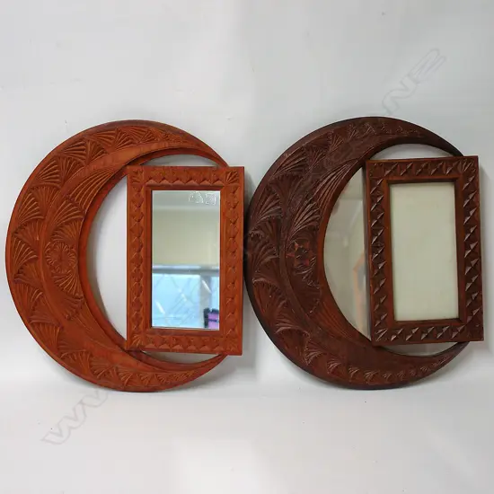 A pair of N.Z. chip art carved frames