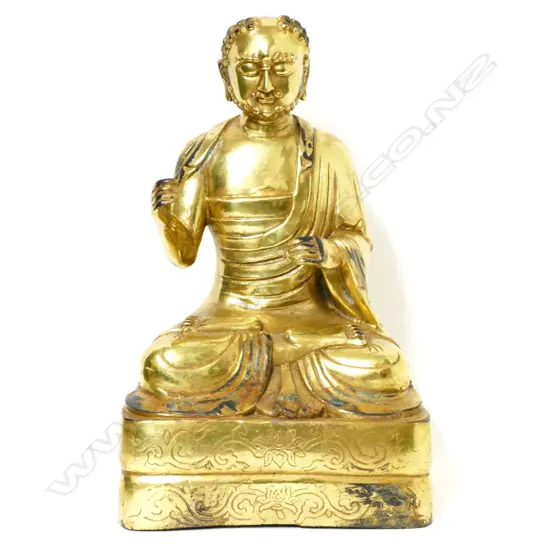 A vintage Chinese gilt bronze figure of a seated monk