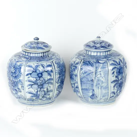 A pair of vintage Chinese lidded blue and white jars